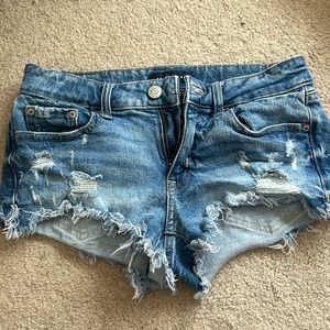 These shorts are from Aéropostale, size 0. Low rise and a dark blue color.